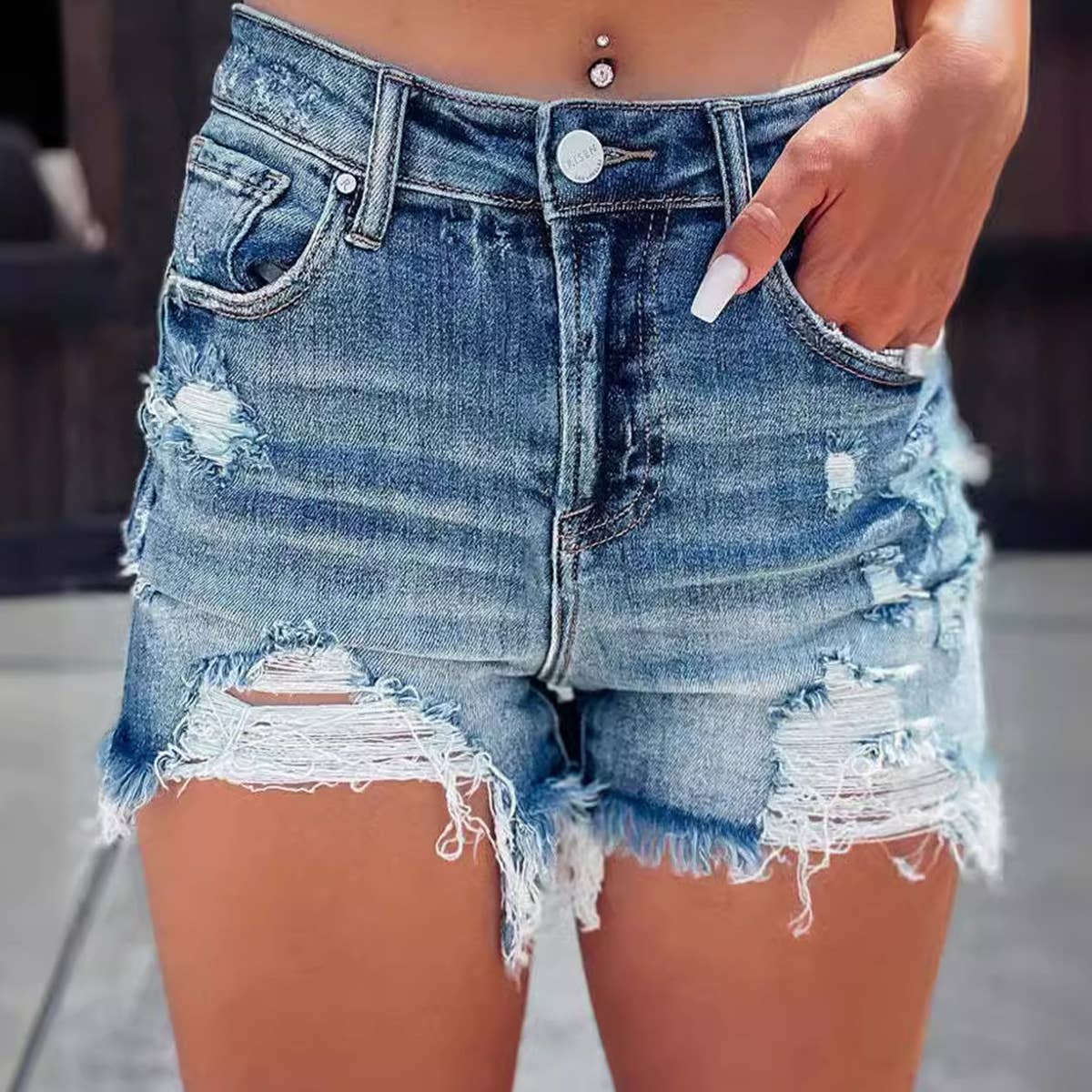 Ripped high-waisted washed denim shorts